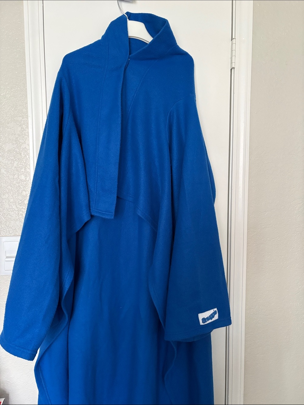 Cozy Electric Blue Fleece Poncho Blanket. Never used in great condition.